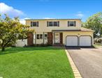 This Very Welcoming 5 Bedroom 3 Full Bath Colonial Home is located in the Lakeland Area of Ronkonkoma, Connetquot Schools. Many, Many Updates, MAINFLOOR: Entrance Foyer, Formal Living Room with Split System AC, Large Eat-in-Kitchen with Oak Cabinets and Wrap-around Corian Counter includingBreakfast Nook, Overlooking Formal Dining Room with Sliders out to Paver Patio with Outside Kitchen including BBQ, Refrigerator, Wet Bar. With amazing View of Huge Flat Back Yard. Main Level also has 2nd Primary Bedroom or Playroom, Large Den with Wood Burning Fireplace has Energy Efficient Insert, Full Bath, Large Sliding Doors looking out to Decking and Yard. This area also has Privacy Pocket Door Separating it from main house, can be a Great Nanny or In-lawQuarters. SECOND FLOOR: 4 Very Large Bedrooms Including Huge Primary Bedroom with Update Full Bath, New Full Bath in Hallway. BASEMENT: Finishedincluding 7-year-old Boiler and laundry rooms. This Home Has Mostly Hardwood floors throughout. Newer Carpets. High Hat Lighting, Ceiling Fans, FreshlyPainted, Newer Windows including Casement Anderson, Updated Roof, 200 Amp Electric, 6 Car Driveway with Paver Apron.