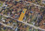 This vacant parcel is conveniently located near parks, highways, and shopping centers. Sold as-is