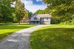 The TRIFECTA, a rare offering that unites a contemporary three-story residence, a private inground pool, and a remarkable 3, 500 SF steel barn privately sited at the back of the property. Set on 3.37 acres along Route 44, just minutes from the heart of Amenia, this property blends lifestyle and business potential in one extraordinary package. The property&rsquo;s centerpiece is the most incredible steel barn, previously an automotive shop, stands as the crown jewel for any tradesperson, hobbyist, or entrepreneur. This 70 x 50 structure boasts two oversized garage doors, 22 foot ceilings at the center, an office, a combination laundry room and bathroom, propane heat, a separate water meter with hot and cold water, its own septic system, and ample parking tucked far from the road. Zoned for Office/Commercial/Industry Mixed-Use, the barn opens endless possibilities for light industry, retail, service businesses, warehousing, or trades like auto repair, landscaping, contracting, tree services, or agricultureâ€”a true field of dreams for those with vision. The home itself is a fantastic opportunity for restoration, offering the perfect canvas to bring its great bones and unique character back to life. This 2, 882 SF three-story residence boasts dramatic peaks, vaulted ceilings, and wide pine flooring waiting to be revitalized. The home&rsquo;s layout is open and spacious, with an interior balcony and a catwalk that add to its distinctive charm. On the ground level, you&rsquo;ll find a rec room, a den or office, a full bathroom, and access to the two-car garage. The main floor features an open-concept dining room, kitchen, and breakfast area with a door that leads to the side deck and pool area. A super-sized living room with great windows and a cozy wood-burning stove provides the perfect spot to relax. This level also includes a laundry room with a door to the back deck and two equal-sized bedrooms with a full bathroom. The top floor is a private primary suite with a vaulted ceiling, two closets, and a bathroom with a large tub and shower. The catwalk leads to an attic with plenty of storage. Outside, the property shines with its vast yard space, ideal for recreation or relaxation, and the pool area serves as a private oasis for summer days. Whether youâ€™re an artist, collector, or professional tradesperson, this property is a one-of-a-kind opportunity to live, work, and create in a setting that blends modern potential with timeless appeal.