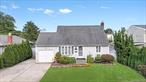 Step into this Beautiful Expanded Cape in the heart of Bethpage, boasting 3 spacious bedrooms, 3 full bathrooms, and a fully finished basement with a private outside entrance. This inviting residence features a sun-filled living room with gleaming hardwood floors, a formal dining area, and an updated chefâ€™s kitchen with granite countertops, custom cabinetry, and an oversized center islandâ€”perfect for both everyday living and entertaining guests. The homeâ€™s versatile layout includes generously sized bedrooms, a flexible home office, and tastefully updated bathrooms designed for modern comfort. The fully finished basement provides valuable additional living space, ideal for a media room, playroom, or private guest suite. Step outside to your own backyard retreat, complete with a large deck and plenty of space for gatherings or quiet relaxation. With its classic curb appeal, functional design, and prime Bethpage location, this move-in-ready home blends charm, comfort, and convenience into one exceptional opportunity.