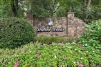 Welcome to this beautifully updated 2 bedroom 2 bath condo is the desirable Bretton Woods Community. This desirable Keystone ranch model is an end unit that also has views of the golf course from the private fenced in patio. Inside is freshly painted with updated laminate flooring and freshly cleaned carpets throughout, two solar tubes, and a greenhouse window. The eat-in kitchen has been updated with a brand-new refrigerator and granite countertops. The second bedroom has custom built-in cabinetry. Perfect for integrated storage or an organized workspace. Heating and cooling systems all replaced in 2018. Newer washer and dryer. Ample closet space and access to common shared basement for storage. This amenity-rich community offers a nine-hole walking golf course, indoor heated pool with jacuzzi, an outdoor pool with a snack bar, 2 lane bowling alley, billiard room, pickleball, tennis, gym, playground, library, movie theater, bocce, and many clubs to join. VP&rsquo;s Cafe is located in the clubhouse and open at 5pm on Wednesday and Friday evenings for dinner. Monthly fees include water, sewer, garbage, snow removal, ground care, basic cable and wi-fi. 24 hour gated community that is wooded and beautifully landscaped.