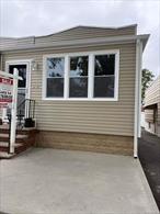 Semi-detached bungalow on the Maspeth horseshoe. Move-in condition home featuring two bedrooms on the first floor, living room, kitchen and bath. Lower level is full sized, finished and has an additional full bath.