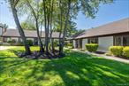 Amazing opportunity to live in a one level bright, spacious ranch style corner unit with quiet, tranquil garden style view just outside your front door!! Unit is in the Picasso Way Community centrally located within all convenience shopping, food stores and county park. Plenty of parking near the unit. Large Owners Suite with accessibility to the full bathroom with newly glazed bathtub and new lighting fixtures. Need space? Entranceway with coat closet that opens to the living room with working wood Fire Place! Large windows For natural light, sit in kitchen for entertaining! Sliding Doors open to the the fully fenced backyard with gate (one of the few with this space!), an extension of space for larger events. Gas Stove, updated appliances with separated door off kitchen with washer/dryer/new hot water heater and soon to be updated electric panel! NEW ATTIC DROP DOWN STAIR FOR LARGE STORAGE SPACE ABOVE HOME! Updated CAC! Enjoy amenities like the Clubhouse, Large Outdoor In Ground Pool, and new PICKLEBALL COURT! Exterior Maintenance includes Snow Removal & Lawn Care. Monthly Maintenance Fee Is $895.00 Which Includes Taxes, Water & Garbage Removal. Purchase Requires Coop Board Approval With A Minimum Down Payment of 15% & Pets Allowed With Board Approval.