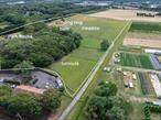 Beautiful 19.9 acres of cleared farmland across three tax lots (8.6 acres, 8.6 acres, and 2.7 acres). The property features a 7-stall barn with tack room, bathroom, hay loft, and wash stall, plus a 4-stall shed row barn, multiple paddocks, and a lighted riding arenaâ€”ideal for equestrian use.Although the residence was recently lost to fire, the foundation, driveway, pool, and landscaping remain, creating a ready site to rebuild the home of your dreams. Utilities are already in place: electric, propane, and well water are active, with electric and water also connected to the barns.Additional improvements include a detached garage and shed (both with electric), along with two active wells and one dormant well. This rare offering combines infrastructure, open acreage, and equestrian amenities in a prime setting.