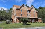 WOW! Welcome to Gedney House! This is the opportunity you&rsquo;ve been waiting for. This gorgeous, fully-furnished Callicoon/Kenoza Lake area home sits on 10 acres with 4 possible rentals! Or you can live in one unit and rent the others to pay for your mortgage and taxes! The building has been tastefully renovated from top to bottom, with chic furnishings, lighting and appliances. All units, including the home, are ready to move right into-- well-maintained and meticulously cleaned. The main house is located in back with an attached 2-car oversized garage and paved driveway. There are 3 BR and bathrooms in the main home with a pass-through kitchen, and combo dining/living area. The BR on main floor and the Living area open to the deck out back. New windows have been installed in the garage and the floor was sealed, plus the basement has been cleaned, sealed, and a new sump pump installed. The primary bedroom in the main home opens to a lovely, private deck. Upstairs, find another good-sized BR, a full bath and laundry. Now to the apartments: they have their own entrances off a common hallway. Apartment 1 is on the main floor, with nice-looking floors throughout. It&rsquo;s a 1 BR, 1bath unit with a washer-dryer, living room, dining room or eat-in kitchen. Upstairs find Apt 2: a 2 BR/1 bath unit with a spacious living area, nice kitchen and washer-dryer with heavy-duty vinyl flooring. Apt 3: Also upstairs-- 2 BR and 1 bath. Has a cheery kitchen, open floor plan with a dining area, living room and nice-sized bedrooms. All units have A/C. and electric heat. There is also a 4th floor which is ready to be finished to your taste. New vinyl floors, porthole windows and a cool loft space. This area is able to be locked off for an owner&rsquo;s space. The whole apartment building has a sprinkler system for peace of mind. The ten acres has a lot of flat cleared land around the homes for outside fun. The remainder of the land is woodedSuch a great location, too-- Kenoza Lake is central to Callicoon with its nice shops, restaurants, theater, Farmers Market, bowling alley and the Delaware River. It&rsquo;s just minutes away from Bethel Woods Center for the Arts, for concerts and markets. It&rsquo;s a popular rental for Bethel Woods concert-goers... it has a 5-star lodging rating! Just a short drive to Jeffersonville and Narrowsburg as well, not to mention Livingston Manor and Roscoe. Easily accessible off 17-B and Rt 52. With the area&rsquo;s housing shortage, this is a perfect opportunity for passive income, while helping others! Make your appointment to see this gem today!