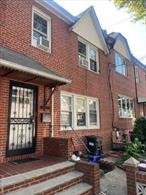 Legal 2 Family Brick Home in the Heart of Middle Village. First floor has gleaming hardwood floors & high ceilings currently being used as a 1 Bedroom can be a 2 Bedroom. 2nd Fl - Move in ready 3 Bedroom apt with EIK, LR. Full Basement 2 Entrances, Underground 2 Car garage.Community Drive with Private Garden and 2 Car garage. One way street close to Juniper Valley Park, Shops and Schools.