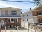Semi-attached legal two-family home in the heart of Queens with a private driveway. Both units feature spacious three bedrooms.