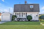 A Charming Home Located in a Small Quiet Community near ALL Major Highways, the LIRR & Multiple Bus Routes....Huge Private Back Yard Made for Entertaining or a Small Family BBQ....Parking Includes a large 1 Car Garage, a Driveway that handles 2/3 Cars with plenty of Street Parking as well....Don&rsquo;t Miss out on this Gem, it won&rsquo;t last long on the Market !!
