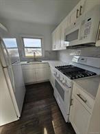 Price reduction!!Newly renovated huge 2 bedroom apt. in the heart of Oceanside. All Updated! Must pay PSEG & cooking gas.