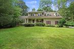 AO as of 9/29. Beautifully sited on a lovely & picturesque acre plus of perfectly flat property on a highly desirable street in the Chappaqua school district, this gracious colonial lives like a four bedroom home. The first floor boasts a formal dining room and living room with oversized windows, a combination eat in kitchen (renovated 2019) and family room with a wood burning fireplace and sliders to the yard, renovated powder room mud room with laundry and garage & driveway access. The upstairs living space features a primary bedroom with en suite bathroom, two bedrooms, a bonus room with a door & closet and full hall bathroom with tub/shower combination. Hardwood floors flow throughout with the exception of one of the bedrooms. The 1000 sq ft unfinished lower level (not included in total s.f) can be an incredible playroom/recreation room when finished and offers an abundance of storage. The stunning open kitchen with custom Coline cabinetry, quartz countertops and breakfast bar seating, recessed lighting and pantry cabinets is a highlight. Improvements made after 2018 include a new roof, boiler and hot water heater. All bathrooms have been completely renovated in the recent years. This meticulously maintained and quality built home with very low taxes situated in a neighborhood that is ideal for biking/walking/play and a picture perfect piece of property is a combination not to be missed!