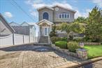 Tucked away at the end of a quiet street in the desirable Seaford Harbor, 3664 Somerset Dr is truly a one-of-a-kind raised waterfront colonial that perfectly blends luxury, character functionality, and coastal living just seconds from the open bay. The home welcomes you with a grand two-story entry foyer, oversized windows giving you tons of natural light throughout soaring 10-foot ceilings throughout the first floor, and an open layout from front to back that makes the space feel expansive and inviting. At its heart, a wood-burning fireplace with custom woodwork and a beautifully designed wet bar creates the perfect setting for entertaining, while the custom gourmet chefâ€™s kitchen features custom cherry cabinetry, expansive granite counters, stainless steel appliances, Thermador gas range/oven, a Viking wine fridge, double beverage drawers, a prep sink, pot filler, and under-cabinet lighting. The open concept flows seamlessly into the dining and living areas, all highlighted by recessed LED lighting, built-in speaker wiring, and elegant crown molding, chair rails, and millwork throughout. Upstairs, three oversized bedrooms include an enormous primary suite spanning the rear of the home with a private Trex deck balcony and breathtaking water views, while 2 designer full bathrooms offer&#160; tile floors, granite vanities, Jacuzzi tubs, and upstairs has a skylit walk-in shower with bench seating. Outside, an entertainerâ€™s paradise awaits with a wraparound front porch, extra deep brick paved driveway leading to detached 2 car garage w/ retractable awning, rear trex deck with an enormous 32 foot octagon pavilion & a full outdoor kitchen, all surrounded by professionally landscaped grounds with mature privacy hedges, a custom waterfall in the front yard, ample green space and a sanded firepit lounge area just off the dock. Boaters will appreciate the Trex dock and one of a kind detached boathouse with electric, slop sink, and storage, while a detached two-car garage with retractable awning and a deep brick-paved driveway add convenience and curb appeal. Additional features include a top-of-the-line CertainTeed Carriage House 50-year roof, cedar shake vinyl siding on entire house, garage & boathouse, Anderson windows, two 150-amp electrical panels, radiant heat on the first floor, split-system cooling/heating in every room, in ground sprinklers, pull-down attic storage, and a mechanical chandelier. More than just a home, this waterfront retreat is built with unmatched quality and thoughtful design, offering every amenity for both relaxation and entertaining. Solar panels are financed to own. Walking distance to Seaford Harbor Elementary, Cedar Creek Park, Neighborhood deli & dining and just a short drive to town & the Seaford Oyster Bay Expressway â€“ A rare opportunity to own a truly one-of-a-kind waterfront colonial in Seaford Harbor.