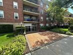 Spacious Jr. 4 - Co op apartment in heart of Lynbrook - close to all - Bright apartment. Walk in to a lovely foyer and laundry room on main floor. Bright Galley Kitchen, dinette area, living room , bonus room enclosed with French doors, king size bedroom, new full bath, lots of closets, one outside parking space, great heated pool surrounded by table and chairs.