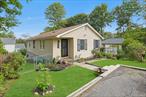 Comfortable, recently updated and featuring one level living in the heart of the Lake Secor community - welcome to 319 Meadow Road. Just a couple of minutes from the Taconic State Parkway, this home is perfectly located for ease of access. Park in the blacktop driveway. Just a few feet away, flanked by a lush green yard and beautiful flowers, is the front entrance. Inside, you are greeted by a bright, open home with gently vaulted ceilings. The living room has plenty of space for lounging and entertaining. To the right, the dining area can fit a large table and is open to the kitchen, keeping the cook well engaged with the home. The kitchen features stainless appliances, a double sink and plenty of cabinet and counter space, as well as a convenient pantry. Just off the kitchen is the door to the large side deck. On this first floor, you will also find the large primary bedroom, with walk-in closet and private full bathroom, with a beautiful vanity and convenient closet. Two good sized bedrooms and a hall bathroom with a tub complete this upper level. On the lower level, you will discover the large family room/den, a private office, another full bathroom and bonus storage space. The lower level is a walkout, and outside is the rear patio, with a fire pit and hot-tub. Around the side, you&rsquo;ve found that large, bi-level deck, a great spot for the grill. .4 miles away is the beach access to Lake Secor. All of this, near to restaurants and shops and minutes from downtown Mahopac. Come and take a look!