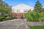 Rare Find! The Only House on the Block! Custom Built Hi-Ranch in Move-In Condition in Prime Whitestone. The Main Level Offers an Eat-In Kitchen, Living Room/Dining Room Combination, Three Bedrooms, and Two Full Bathrooms. The Primary Bedroom Offers a Walk-In Closet and En-Suite Bathroom. The Lower Level Features a Two Car Garage, a Large Recreation Room, Summer Kitchen, Half Bathroom, Boiler Room, and Closets Galore. The Semi-Finished Pull Down Attic Perfect for Additional Storage. Two Zone Gas Insta Hot Water Heating System. Located in Close Proximity to Schools, Shops, and Loads of Transportation.