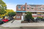 Presenting a fully renovated 2, 205 square foot townhouse that perfectly blends modern luxury with classic brick architecture. This comprehensive renovation has transformed every aspect of this Williamsbridge residence into a stunning turnkey home, where elegant finishes and thoughtful updates create an ideal urban sanctuary. Located in the established Williamsbridge neighborhood, residents enjoy a vibrant community atmosphere with excellent public transportation access - a convenience utilized by 48% of the community for daily commutes. The tree-lined streets and strong sense of community are complemented by the area&rsquo;s rising prosperity, with household incomes averaging 17.5% higher than the county average. The home&rsquo;s contemporary open-concept layout creates a natural flow for modern living. The heart of the home features a spacious living room that seamlessly connects to a chef&rsquo;s kitchen, equipped with high-end stainless steel appliances, sleek white cabinetry, and designer finishes. Polished hardwood floors, recessed lighting, and large windows throughout create bright, inviting spaces perfect for both relaxation and entertaining. Multiple well-appointed bedrooms and luxuriously updated bathrooms with marble-tiled walls and contemporary fixtures offer private retreats for family and guests. The finished basement provides versatile space for a home office, gym, or entertainment area, adapting to your lifestyle needs. Outdoor living is enhanced by a welcoming front porch with new tiling and wrought iron railings, creating the perfect spot for morning coffee or evening relaxation. Practical amenities include a storage shed and protective awnings, adding both functionality and charm to this urban oasis. This thoughtfully renovated property offers the perfect blend of sophisticated design and practical comfort, ideal for those seeking a move-in ready home in one of the Bronx&rsquo;s most desirable neighborhoods. Every detail has been carefully considered to create a seamless living experience from the moment you step through the door.