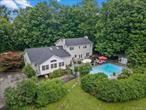 Welcome to your dream property in the Pine Bush School District!!! This exceptional estate offers space, versatility, and privacy on just over 11 acres of beautifully maintained land. At the heart of the property is a classic colonial-style homeboasting 5 bedrooms and 3.5 bathrooms, with a total of approximately 5, 500 square feet of living space. Whether you&rsquo;re entertaining guests or enjoying a quiet evening at home, this layout offers the perfect balance of comfort and functionality.Added feature that youâ€™ll love is the 3-bay garage, which is generously sized to fit up to 6 cars. A walk-out basement adds even more potentialâ€”ideal for a home gym, rec room, or additional storage.Need extra space for extended family, guests, or rental income? The accessory house is approximately 1, 900 sq ft and includes 2 bedrooms and 2 full bathrooms, offering privacy and independence with all the comforts of home.Step outside to your private oasis: an inground pool, pool house, and a basketball court make this property truly one-of-a-kind. Whether you&rsquo;re hosting summer parties or just relaxing on the weekend, you&rsquo;ll have everything you need right at your fingertips.Additional highlights include a roof thatâ€™s only 2 years old, mature landscaping, and ample room for gardening, recreation, or just relaxation.This rare gem combines luxury, space, and functionality in a serene settingâ€”donâ€™t miss your chance to make it yours!
