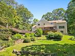 Sophisticated Colonial. Fabulous opportunity to own a spectacular home in the desirable Wood Lot neighborhood of Katonah. Spacious and sun-filled Colonial with contemporary overtones. Meticulously maintained with graciously proportioned rooms. Fabulous open floorplan for easy entertaining and everyday living. Skylit two-story Entrance Hall opening to stunning Living Room with vaulted ceiling and fireplace. Beautifully proportioned Dining Room for elegant dinners. Well-designed Kitchen with breakfast area opening to Family Room with fireplace. Private Study/Office ideal for working remotely. Four Bedrooms include a private Primary Suite with luxurious Bath. Recreation Room with doors out, gym and wet bar. Crafts Room for art projects. Private deck overlooking the Swimming Pool, Tiki bar and outdoor fireplace. A great neighborhood in the desirable Somers School District and just minutes to Katonah, train and commuting arteries. Rare!