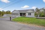 No expense spared in this stunning, one-of-a-kind split-level home! Lake rights, land, and endless upgrades!Custom-built in 2013 and thoughtfully upgraded since, this 3-bedroom, 2.5-bath beauty sits on just under an acre in the charming town of Wurtsboro. With deeded lake rights to Yankee Lake, you&rsquo;ll enjoy all the luxury of lake life-without the upkeep-plus easy access to Route 17 for dining, shopping, and a manageable commute to NYC.Step inside and prepare to be impressed. Gleaming real oak hardwood floors and an airy, open kitchen flow seamlessly into a sun-drenched living room, complete with cathedral ceilings and a show-stopping full masonry fireplace faced in real stone. Every detail has been designed for comfort and quality - from plumbing fixtures with dedicated water lines (no pressure drops!), walk in master closet, to a wood stove hookup with real vented heat return, giving you the option to heat the entire home without the furnace.The exterior is just as impressive. Out front, a bluestone porch welcomes you home. Out back a double deck with maintenance free PVC railings, LED lighting throughout, and a full brick chimney sets the stage for effortless entertaining. Your private backyard oasis borders land where no building is allowed, ensuring peace, privacy and a true nature lover&rsquo;s retreat. Every modern upgrade has been considered: 7-camera security system (interior + exterior), full certified water treatment system, hybrid electric hot water heater,  Generace whole house generator.And for the craftsman or hobbyist: along with the 2-car attached garage, you&rsquo;ll find a detached garage with its own 200 amp electric service covering a 3 bay 1, 200 square foot garage perfect for a workshop or creative space.With additional deck and basement enhancements completed in 2020, this home blends upscale living, everyday convenience, and timeless craftsmanship into one unbeatable package.