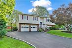 Updated & expanded 6 bedroom, 3.5 bath home in picturesque residential neighborhood. Enjoy spacious living in this 3, 400 sqft home with large center island kitchen open to vaulted sun filled Great Room with fireplace and doors to deck overlooking private backyard. King size primary bedroom with updated bath, 5 additional bedrooms and 2 additional baths - great for large family or home office. Expansive ground level features 2 family rooms, bedroom, powder room and bonus 19x19 storage room leading to 2 car garage. Great home for entertaining inside and out with oversized deck and paver patio with cozy firepit in your lush private yard. Don&rsquo;t miss this exceptional home close to public transportation, shopping and everything Nanuet has to offer. A must see!