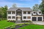 Brand-new custom Center Hall Colonial blending modern design with timeless style. The open floor plan flows from a fully equipped kitchen to a fireplace-warmed living roomâ€”ideal for entertaining and everyday life. Four spacious bedrooms include a primary suite with walk-in closet and radiant-heated bath. Central A/C, on-demand hot water, and first-floor laundry add comfort and efficiency.A full basement, walk-up attic, and unfinished space over the garage offer abundant storage or room to expand. The 2-car garage with high ceilings accommodates a lift, while a large driveway provides extra parking. Timberline roof with lifetime guarantee and oversized gutters. Enjoy serene Nelson Pond seasonal views from the expansive deck and landscaped yard. Located on a quiet street near schools, parks, and Metro-North, with easy access to Route 9 and the Taconic Parkwayâ€”perfect for commuters.