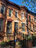 Welcome to 647 St Johns Place where you&rsquo;ll find this estimated 2, 160 Sf Twentieth-Century Brick Townhouse located in the Crown Heights neighborhood right off Franklin Avenue. This Townhouse offers Two Units comprising a Duplex Featuring a Living Room with Fireplace, Formal Dining Room, Half Bathroom, Kitchen leading to the Backyard which offers approximately 1, 200 sf of Open Space on the Main Floor and Two Bedrooms, Full Bathroom on The Upper Level and a Parlor Unit of One Bedroom, Sitting Area, Full Bath and Kitchen. According to county records, the FAR on this property would allow potential additional expansion ( Consult your own independent source ) for more details. This property is located just a short walk to the S/2/3/4/5 trains at Franklin Ave / Eastern Pkwy and just walking distance from Prospect Park, the Brooklyn Museum, Brooklyn Botanic Garden, the Grand Army Plaza, local dining spots and shopping districts nearby.