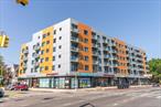 Spacious one-bedroom corner condo in the heart of Rego Park, offering 621 SF of interior space and a private balcony for relaxing or entertaining. This well-maintained unit is part of a modern building featuring great amenities, including a fitness center, laundry room, bike storage, and a beautifully landscaped outdoor recreation deck.Conveniently located just a 13-minute walk to Queens Center Mall and 10-13 minutes to the M and R subway lines. Multiple direct bus lines provide easy access to Midtown and Downtown Manhattan, including the Q53-SBS to Elmhurst. Tax abatement in place through 2033