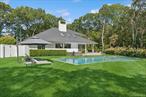 Nothing compares to summer in the Village of Quogue: especially at this newly designed and tastefully furnished Hamptons retreat. Thoughtfully renovated and styled by a designer, this residence delivers the ultimate Hamptons summer experience, blending sophistication with ease. Step inside to find nearly 4, 000 square feet of sun-filled living space, featuring a wide-open layout, soaring ceilings, and brand-new hardwood floors that highlight the homeâ€™s natural light. Four spacious bedrooms and four-and-a-half bathrooms offer comfort and privacy, while a chefâ€™s kitchen and multiple lounge areas provide the perfect backdrop for both entertaining and relaxation. Outdoors, summer living takes center stage with an oversized heated gunite pool and spa, framed by expansive decking for endless lounging and gatherings under the sun. Ideally located just minutes from the world-renowned Quogue Village Beach, this home is more than a getaway: itâ€™s your private Hamptons sanctuary to relax, recharge, and enjoy the season to its fullest.