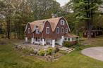 Historic Artistâ€™s Retreat in CragsmoorNestled atop the Shawangunk Ridge in the storied hamlet of Cragsmoor, this singular home was designed by painter, explorer and writer Frederick S. Dellenbaugh, and offers a rare opportunity to own a piece of American art history. Built circa 1907 and listed on the National Register of Historic Places, this 4BR/2BA home spans nearly 2, 100 sq ft across three levels and sits on 4 acres of naturally sculpted land with old-growth sugar maples, striking glacial boulders, a stream and sweeping grassy knolls. Dellenbaugh, a founding member of Cragsmoorâ€™s 19th-century artist colony, alongside notable painters like George Inness, created this residence as part of a larger vision, an enclave where creativity and landscape intertwined. The home retains its historic character with original woodwork, hand-crafted details and a sense of quiet elegance that unfolds room by room. Large windows frame ever-changing light and nature views, while a stone patio offers the perfect perch for morning coffee or an alfresco dinner party under the stars. The grounds feel timeless, part curated, part wild with the kind of privacy and serenity thatâ€™s increasingly rare. Whether you&rsquo;re wandering through the trees, lounging beside the stream or entertaining with friends on the lawn, the experience is immersive and deeply grounding. Just outside your door is direct access to Bear Hill Nature Preserve and just down the road is Sam&rsquo;s Point, where thousands of protected acres offer hiking, blueberry fields, waterfalls and dramatic cliffs. And while this mountaintop retreat feels worlds away, itâ€™s only 90 minutes from the GWB. This is more than a home. Itâ€™s a legacy property in one of the Hudson Valleyâ€™s most magical and storied communities.