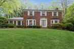 Expanded Exeter Brick Front Stately Center Hall Colonial in Prime Cul de Sac in the Strathmore Section off Wilmington Drive. 15 year old Maple and Stainless Eat in Kitchen with Granite Counters and Backsplash, Newer LG Refrigerator, Bosch DW, & GE Range. Newer Skylights, Windows and French Doors in EIK that opens to Large Wood Patio. LR with FP, that opens into Expanded Atrium Room. 5 Large Bedrooms and 3.5 Baths including Main Level Bedroom and Full Bathroom. Upstairs Hall Bathroom with Large Corian Counter Top, Wood Vanity with Built-Ins and Oversized Walk in Shower with Body Jets and Seat,  Primary Bathroom is Ten Years Young with Dressing Area with Double Corian Counter Tops and Built-in Wood Vanity, Large Walk in Closet and then Separate Bathroom with Corian Counter, Jacuzzi Tub and Walk In Shower. Full Finished Basement, Newer Washer and Dryer, IGS, Alarm, Rheem Gas Boiler, CAC, 6 Year old AC Smith 50 Gal HW Heater, Oversized 2 Car Garage. Property is Very Private. Endless potential! This is the One you have been waiting for! Deeded for Strathmore Pool and Tennis Club. Gas and Sewers!