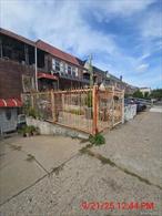 brick attached 3 family with 3 two brr unis. Walking distance o all amenities