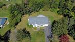 Welcome to this inviting ranch, perfectly set on an amazing .61-acre property (174x148) just moments from the Long Island Sound. Built in 1993, this home offers 2 bedrooms with an easy conversion to 3, including a primary suite with a private ensuite bath. The vaulted ceilings in the living room, kitchen, and dining area, along with skylights, create a bright and open feel. The spacious living room features a cozy fireplace, perfect for cool evenings. Enjoy outdoor living on the spacious deck overlooking a huge yard with endless possibilities. Additional highlights include a full basement, 1-car attached garage, and low taxes of just $10, 141.78 after STAR rebate. This home combines comfort, space, and locationâ€¦donâ€™t miss the opportunity to make it yours.
