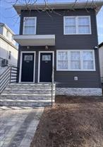This beautiful newly renovated apartment in the heart of Queens Village. It features an open floor plan, two bedrooms, two modern bathrooms, stunning kitchen, custom cabinetry, stainless steel appliances and hardwood floors through out.