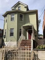 Full finished basement with bath. 1st FL 3 bedrooms, living room, formal dining room, eik, full bathroom. 2nd FL 4 bedrooms, living room, eik, full bathroom. Separate garage and beautiful backyard. Unfinished Attic.