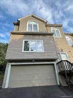 Welcome to Your Dream Home! Nestled in the picturesque community of Highland Mills, this exceptional townhouse offers a blend of modern elegance and comfort, all within the esteemed Monroe-Woodbury school district. This stunning residence features three spacious bedrooms and 2.5 luxurious bathrooms across 1, 569 square feet of thoughtfully designed living space.For city transplants, this home provides unmatched convenience, located just minutes from the New York State Thruway and only a short drive to the renowned Woodbury Common Premium Outlets, perfect for all your shopping needs. Plus, the Harriman train station is just a hop away, making commutes to Manhattan effortless!As you enter, you are greeted by exquisite bamboo flooring that flows gracefully through the open-concept layout, highlighting the inviting living room, dining area, and staircase. The heart of the home is the living room, where you can immerse yourself in an extraordinary entertainment experience with a state-of-the-art theater surround sound system, enhanced by customizable recessed lighting with adjustable dimmers. Cozy up next to the elegant fireplace during the chilly months and create lasting memories with family and friends.The chefâ€™s kitchen is a culinary delight, boasting 40-inch cabinets, updated countertops, and under-cabinet lighting that illuminates your cooking space. Each bedroom serves as a serene retreat, complete with recessed lighting and ceiling fans for added comfort. The primary suite is a true haven, featuring a spacious walk-in closet and sophisticated top-down, bottom-up blinds for enhanced privacy.Both full bathrooms have been meticulously renovated, featuring heat fans to ensure a cozy environment, while the newly finished basement provides additional space for relaxation or entertainment. Step onto your expanded 10â€™ x 20â€™ deck, ideal for alfresco dining, and enjoy the tranquility of the surrounding woods, complete with an awning for those sunny afternoons.Significant improvements have been made to this home, including a new roof and an advanced HVAC system with increased tonnage to maintain optimal comfort throughout the year. Additional features include enhanced baseboards, crown molding, and decorative bolding throughout, as well as strategically placed vents in the bathrooms for efficient heating and cooling.Living in Highland Mills affords you exclusive access to the Woodbury Community Center, where you can enjoy a reservoir, basketball courts, tennis courts, a sparkling pool, and various special eventsâ€”all for a nominal fee of just $30!This is more than just a home; itâ€™s a lifestyle of comfort, convenience, and community. Opportunities like this are rare in Highland Mills, so donâ€™t let it slip away! Schedule your private tour today and step into the life youâ€™ve always envisioned.
