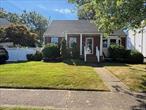 Beautiful Brick Cape with charming front porch, Completely renovated 4 Bedrooms 2 Baths, family room, wood floors w/full half finished basement w/OSE Washer/dryer Hookup. New windows. Kitchen S.S appliances w/ Granite counters tops. New Heating system 2 years old, 2 zones, 200AMP. Sump pump. Professionally landscaped. Covered deck in back yard. NO FLOOD INSURANCE NEEDED X Zone!!