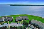 Location, Location, Location! Experience the luxury waterfront living in the sought-after Cleaves Point Club and Marina community of East Marion. This coastal panoramic beauty with private beach, private marina, clubhouse, gym, pickle ball courts, tennis courts, and basketball court as well as a inground pool is a must see. Beautiful primary suite, gourmet kitchen, fireplace, solid oak hardwood floors and bonus loft , storage . Too much to List! Close to Golf and Greenport Village. Experience what the North Fork has to offer.
