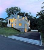 Exceptional new construction colonial nestled in the prestigious hamlet of Woodbury, NY.Blending classic charm with modern luxury. It offers 4 spacious bedrooms, 3.5 carefully designed bathrooms, and elegant white oak floors throughout.Enter through a custom 8-foot glass door into a grand foyer with an impressive 18-foot ceiling. The main floor has 9ft ceiling and includes a large living room, a stylish dining area opening to a private balcony, and a cozy family room with a gas fireplace custom mantel, and a the chef&rsquo;s kitchen you dream about.Upstairs features a master suite with a large balcony, a spa-like bathroom with a soaking tub, and large walk-in closets. Three other spacious bedrooms.Walking level / basement Epoxy Floors Throughout and include a 2-car garage, bonus space, wine cellar, laundry and media room.Extras include: Apron 4000 sq ft, White Oak Hardwood Floors, Cursor Bianco Impala Quartzite Mantel, 2 Balconies, 2 car Garage, Azek Trim & Soffits, 7â€ Hardie Board Siding, Pella Doors & Windows, 8 Full Coverage Appliances Warranty.Come and see this ULTRA Custom Home
