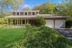 Enjoy the blissful quiet and fragrant coolness of Rolling Woods, from the covered front porch swing or rear garden patio. Strategically located between the WIDEST Long Island Sound permit-required beach and the North Fork&rsquo;s beloved, agriculture-focused, action-packed Sound Avenue, while only a quick trip to the East End&rsquo;s most diverse shopping districts along Riverhead&rsquo;s Main Street and Old Country Road. Inside there&rsquo;s lots of room and great light, an eat-in kitchen, formal dining room, formal living room, huge den with wood-burning fireplace, laundry closet, super-sized 2-car garage, full basement, partial attic, 2 full baths, one half bath and 4 bedrooms, one of which is en-suite.