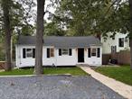Beautiful 3 Bedroom Split Ranch with New Custom Kitchen with soft close doors/draws, New Quartz Tops, SS Appliances including Microwave, Hardwood Floors, Full Basement, Split Units for heating/Air Condition, New Sod, New Bluestone Driveway, Wood Burning Fireplace, Dead end street, Anderson Windows, Low Taxes $8, 439.20 w/o Star. Rocky Point School District, Walking distance to the Beach .05 of a mile.
