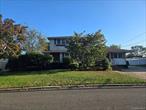 Welcome to this charming home on a picturesque, quiet, tree-lined street in Commack. Perfect for family gatherings, the main floor features a spacious dining room, living room and a large, expanded kitchen that is open to the family room with views of the backyard, full bath. Converted garage (no CO) to main floor bedroom, hardwood floors, gas for heat and cooking , oversized driveway. Upstairs features four generously sized bedrooms and a full bath. The finished basement boasts a separate entrance, laundry area, utilities and ample extra space.