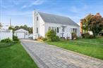 Miller Cape with FULL BASEMENT with Out Side Entrance. New Long Paved Driveway to Oversized Garage. Great Back yard with New Large paved Patio. Central air conditioning. Hard wood Floors. Updated Roof, Siding and Windows. Island Trees SD #26 LOW LOW !! TAXES DO NOT Reflect Star Savings !!