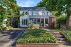 Welcome to 136 Scarcliffe Drive, a charming 3-bedroom Colonial in the heart of Malverne. Offering 1, 748 sq. ft. of living space, this home features a spacious living room with fireplace open to a large dining room, an efficient kitchen, and a bright windowed family room overlooking the yard and patio. Enjoy morning coffee on the welcoming front porch, all set on a quiet block just moments from the village center and Malverne LIRR station. Upstairs, youâ€™ll find three comfortable bedrooms and a full bath. The basement provides storage, laundry, and utilities. With great potential on a desirable street in Valley Stream SD 13, this home is an exceptional value in Malverne Village!