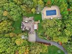 Explore this amazing custom-built contemporary residence, thoughtfully designed to harmonize practical living with the tranquility and charm of its countryside surroundings.Boasting an expansive 2, 800 square feet of interior space, this home offers a seamless flow from the striking living roomâ€”featuring a soaring cathedral ceiling and skylight that bathes the space in natural light throughout the dayâ€”to a generously sized formal dining room and a custom eat-in kitchen that any culinary enthusiast will truly appreciate. Step through the sliding glass doors onto the spacious composite deck and enjoy effortless entertaining.Additionally on this main-level is the Primary bedroom with a tray ceiling in both the bedroom and the four fixture, fully tiled ensuite bath. Just upstairs the second floor includes the 2nd bedroom, large home office and a fully tiled main hall bathroom. For added luxury, a flexible space awaitsâ€”ideal for an elegant shoe salon, a private fitness gym or refined storage. On the lower level, discover a spacious family room with a 36? entry door from the paver patio, the third bedroom, and a flexible playroomâ€”ideal for crafts, hobbies, or games, complete with plenty of shelving. This level could easily be made to accommodate a handicapped individual.Set gracefully on a knoll, this 3-acre private property showcases mature landscaping, flourishing flower beds, sunny garden spots and a driveway enhanced with Belgian block inlay. Step into the backyard to host gatherings with ease on the spacious expansive composite deck, then cool off or unwind in the inviting heated poolâ€”perfect for relaxing with family and friends.Set amidst the natural beauty of the countryside, this property presents a refined and practical layout, perfectly harmonizing with its idyllic and sought-after rural surroundings.Close to 15 mins to Metro North-Southeast-Harlem LineReach out today to schedule a private tour.
