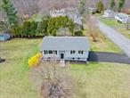 NEWLY RENOVATED AND MOVE IN READY!!! Discover this beautifully updated 3-bedroom, 2-bathroom Raised Ranch home, ideally situated in the heart of the Town of Wallkill and within the highly sought-after Wallkill School District. This charming home offers a prime location just minutes from Route 32, providing easy access to the Town of Plattekill, where youâ€™ll find an array of dining options, shopping centers, and local conveniences. Nature lovers and outdoor enthusiasts will appreciate the proximity to Minnewaska State Park Preserve, scenic Hudson River cruises, and the vibrant arts scene at The Mark Gruber Gallery. Plus, enjoy nearby parks and fresh local produce from nearby farms. The location is just the beginningâ€”this stunning home is packed with features youâ€™ll love! Step into the beautifully designed kitchen, showcasing rich wood cabinetry, sleek stainless steel appliances, gleaming granite countertops, and a stylish subway tile backsplash that enhances its contemporary charm. Adjacent to the kitchen, the bright and inviting dining area boasts elegant pendant lighting and sliding glass doors that lead to a spacious deck. The expansive living room features large windows that flood the space with natural light, complete with oak hardwood flooring throughout. This home offers three generously sized bedrooms with ample closet space and a fully updated modern bathroom. Downstairs, the lower level presents a cozy family room with a decorative fireplace, durable laminate hardwood flooring, a full bathroom with a shower stall, and a dedicated utility room that doubles as a private laundry area. The exterior is just as impressive, featuring a two-car attached garage, additional driveway parking, and extra storage space in the wood-framed shed. This home will not last long on the market, don&rsquo;t delay, call now for your showing!!!