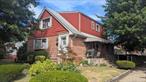 Hurry WILL NOT LAST!! LEGAL TWO FAMILY !!!Corner Lot 50 x 100 and 2 CAR GARAGE 2 Sep Elc METERS. Full Basement 1/2 Fin. One Block from 25A with all Shopping and Transportation!!