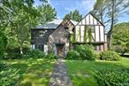 Welcome to 1 Linford Rd, an exceptional residence in the heart of the coveted Village of Russell Gardens. Situated on a magnificent 16, 583 square feet corner lot, this classic Center Hall Tudor/Colonial offers a rare combination of architectural beauty and contemporary convenience on one of the villageâ€™s most picturesque, tree-lined streets.This residence boasts 5 spacious bedrooms, 3 full and 2 half bathrooms, and a layout designed for both gracious entertaining and comfortable everyday living. Step into the inviting foyer and discover rich architectural details â€” custom millwork, soaring ceilings, classic moldings, and gleaming hardwood floors throughout. The staircase from the first to the second floor is grand and wide, reminiscent of a theater staircase, offering both comfort and elegance.The elegant and spacious formal living room with a wood-burning fireplace,  paneled library, a grand formal dining room sets the stage for memorable gatherings, while the renovated eat-in kitchen features stainless steel appliances and the sun-drenched dinning room with direct access to the lush, beautiful and huge private backyard and patio adds to the homeâ€™s welcoming atmosphere. The finished lower level includes a generous playroom with fireplace, gym, laundry area, and abundant storage space, could be used for media/entertainment room. Additional highlights include recessed lighting throughout, a 2-car attached garage.Residents of Russell Gardens enjoy private access to pool and tennis facilities ($1, 400/year), along with optional membership in the Great Neck Park District â€” offering amenities at Parkwood and Steppingstone Park. This prime location is moments from the LIRR, Northern Blvd, highways, bus lines (N20/N21), top-rated schools including Lakeville Elementary and Great Neck South Middle & High Schools, as well as local dining, shopping, and the public library. This is more than just a house; itâ€™s the home youâ€™ve been waiting for.
