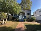 Adorable Home In Harborfields SD. Centrally located by Greenlawn Village, High School and Park. 3 Bedrooms, 1 Full Updated Bathroom, Mud Room with French Doors to Living Room and Dining Area, Kitchen with New Appliances, Refinished Floors, Freshly Painted. Washer/Dryer in Basement. Spacious Backyard with Patio.