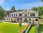 A rare offering in Rye: a newly constructed residence of exceptional scale and craftsmanship, graced with sweeping golf course views. Set on 1.37 acres, this 7, 584 sq. ft. home is unlike anything else on the market, offering modern innovation on one of the most coveted private roads in Rye.The dramatic entry hall, crowned by a 21-foot ceiling and anchored by a Venetian plaster fireplace, introduces interiors of remarkable light and proportion. Expansive Marvin windows frame the verdant vistas, while wide-plank white oak floors and refined architectural detailing lend a sense of understated sophistication throughout.At the heart of the home, the kitchen showcases DOCA cabinetry imported from Spain, professional-grade Wolf and Sub-Zero appliances, and a full scullery enclosed by steel-and-glass doors. A butlerâ€™s pantry and bespoke dining room cabinetry further elevate the entertaining experience.Six ensuite bedrooms include a first-floor guest suite and a magnificent primary retreat with a private terrace, dual custom closets, and a spa-inspired Porcelanosa bath with radiant heated floors.The lower level offers a generous family room with bar, private guest suite, and space prepared for a golf simulator and/or home theater. Outdoors, a stone terrace and level groundsâ€”engineered to accommodate a future poolâ€”create endless possibilities for leisure and entertaining.Additional features include a full Sonos and Lutron lighting system, radiant-heated bathrooms, multiple laundry rooms, and a standing seam metal roof. A smart-home security system, mudroom, and two-car garage provide both convenience and peace of mind.A home of rare distinction, 11 Boxwood Lane pairs new construction with an unparalleled settingâ€”an extraordinary opportunity in the heart of Rye.*Image of pool is a rendering of potential pool site. Plans were approved by town*