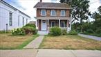 This quintessential Fishkill Village rental home is available November 1st. It is lovingly maintained, has nice updates and is located in the most ideal location! The home is open and bright and the first floor offers a living room, dining room, half bath, kitchen and porch access. The second floor has two well-sized bedrooms and a full bath. The walk-up attic can be used for storage and the basement is also ideal for storage and for the use of the washer and dryer. Beautifully refinished flooring can be appreciated throughout the home, a new kitchen floor and fresh paint, making it so clean and move-in ready. The home has driveway parking, adding to the convenience of the location as well. 5 mins will get you to I-84, 10 mins to Metro North (Beacon), 60-75 mins to NYC, 45 mins to White Plains. In addition, the ability to walk to shops, schools, library and dining, makes this location supreme. This is a wonderful rental opportunity in one of the most sought after Southern Dutchess County locations! The tenant is responsible for garbage removal, gas heat and electric (one Central Hudson bill) and the owner pays for water/sewer and mowing and snow removal. Documented income, decent credit and references a must. Pets/animals and smoking are not permitted.
