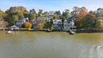 Wake up to panoramic Hudson River views in this stunning Verplanck waterfront home with its own dock access. Spacious and sunlit, the home features an open living/dining area with hardwood floors, a cozy fireplace, and oversized windows framing sweeping river scenes. Enjoy cooking in the updated kitchen, then step outside to expansive decks ideal for entertaining or relaxing. Multiple indoor and outdoor gathering spaces, including a riverfront lawn, provide the perfect setting for summer nights, morning coffee, or hosting family and friends. With direct water access for boating and kayaking, plus proximity to Metro-North, marinas, and local dining, this property offers the best of Hudson Valley riverfront living. A rare opportunity you donâ€™t want to miss!